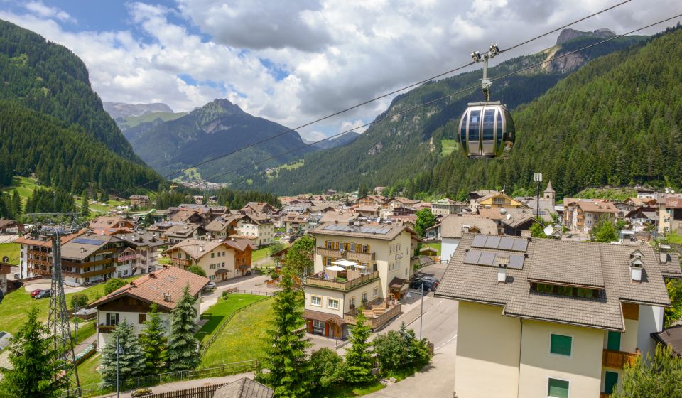Seilbahn Canazei–Pecol: Schneller Einstieg ins Skigebiet Belvedere und zur Sellaronda, auch im Sommer ideal
